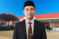 Ketua Divisi Sosialisasi Pendidikan Pemilih, Partisipasi Masyarakat, dan Sumber Daya Manusia KPU Bolmut Firman SY, Stion 