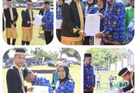 Bupati Sirajudin Lasena di Dampingi Wakil Bupati Moh, Aditya Pontoh saat penyerahan 948 SK ASN dimomentum Hut Bolmut ke-18