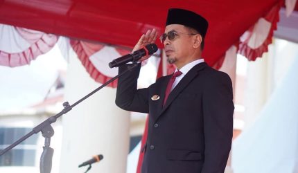 Bupati Boltara Dr Sirajudin Lasena saat menjadi Inspektur Upacara pada peringatan hari kesaktian pancasila tahun 2025 dihalaman Kantor Bupati Rabu (1/10/2025)