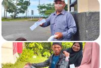 Aktivitas pembayaran retribusi di pintu masuk Pantai Batu Pinagut masih dilakukan secara manual oleh warga pengunjung, Senin (23/3/2026).