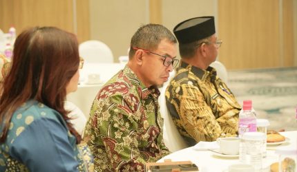 Bupati Boltara, Sirajudin Lasena, saat menghadiri forum di Luwansa Hotel Manado dan mendorong kemudahan akses modal bagi petani.
