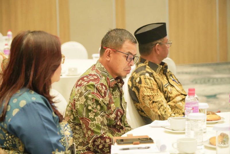 Bupati Boltara, Sirajudin Lasena, saat menghadiri forum di Luwansa Hotel Manado dan mendorong kemudahan akses modal bagi petani.