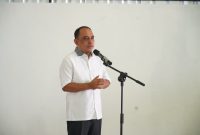 Bupati Bolaang Mongondow Yusra Alhabsyi saat menyampaikan sambutan pada peluncuran nasional Koperasi Merah Putih di Desa Tadoy, menegaskan komitmen pemerintah daerah dalam memperkuat ekonomi desa dan pemberdayaan UMKM.
