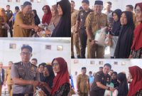 Asisten Bidang Pemerintahan dan Kesra Boltara, Fadly T. Usup, bersama unsur Kejaksaan, Polsek, dan jajaran pemerintah daerah dalam kegiatan pasar murah di Desa Jambusarang untuk membantu masyarakat mendapatkan bahan pokok dengan harga terjangkau.