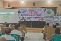 Asisten I Setda Kotamobagu Sahaya Mokoginta membuka rapat sinkronisasi RKPD dan RKPDes 2027 untuk menyelaraskan prioritas pembangunan, pengentasan kemiskinan, dan penguatan ekonomi lokal.